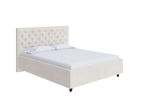 Односпальная кровать Teona Grand - Кровать с увеличенным изголовьем, украшенным благородной каретной пиковкой.